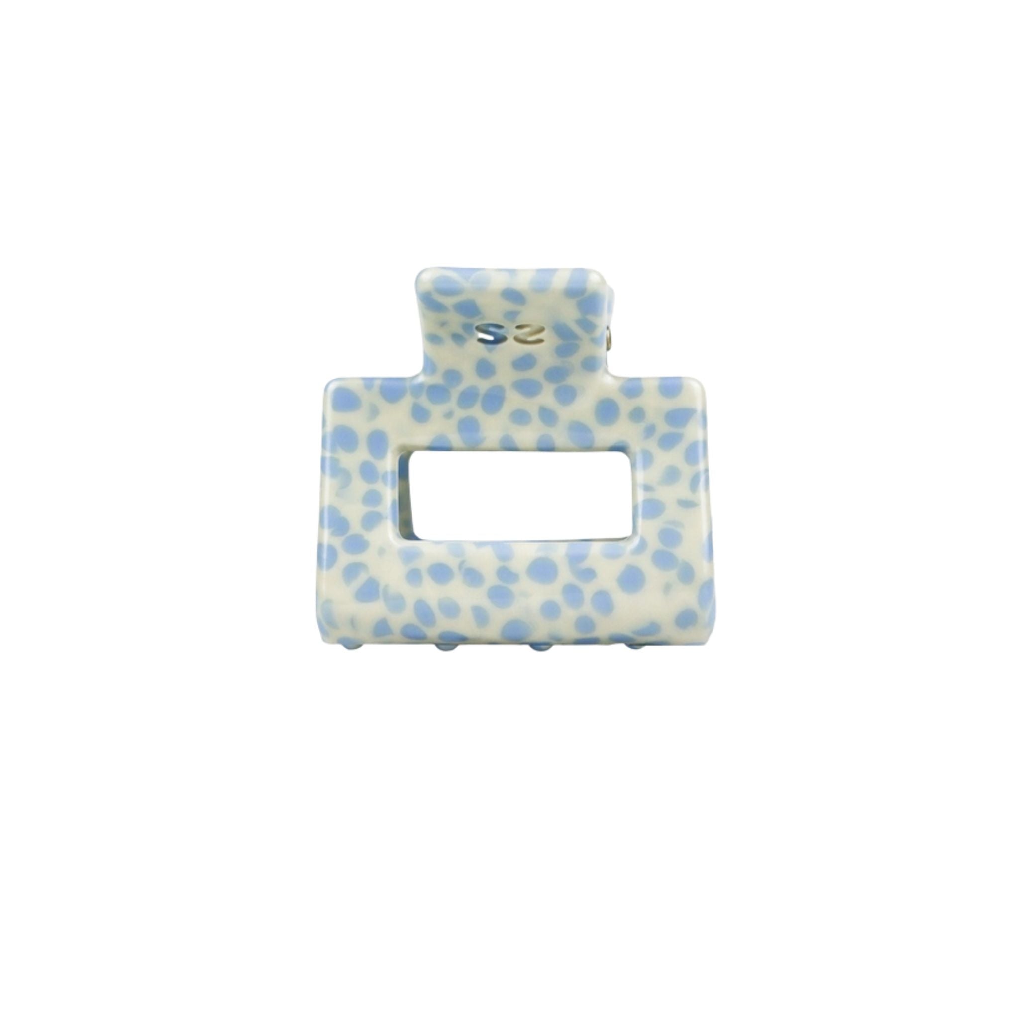 small blue and white hair clip