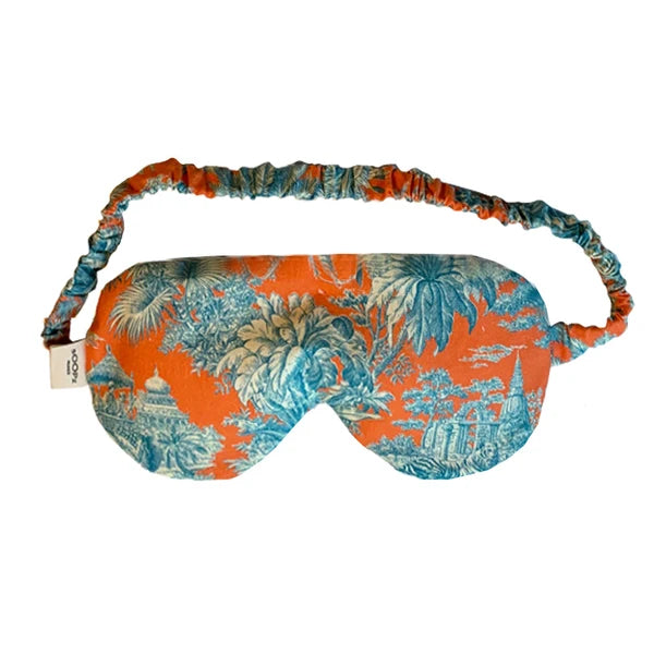 Maharaji Schlafmaske in Orange mit blau/grünem Muster mit Tige; Tempel und Palmen.