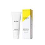 Nuori Creamy Quartz & Enzyme Exfoliator, weiße Tube mit weißem Verschluss und gelber Verpackung, 75ml, Hautpflege